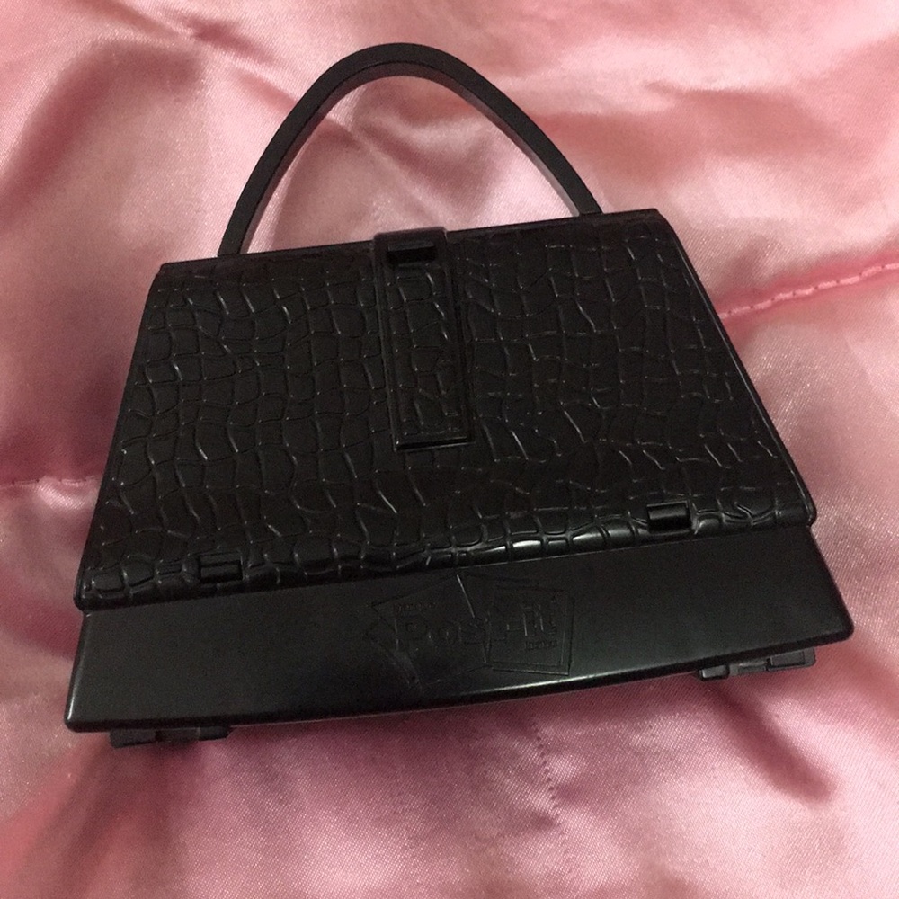 Purse shaped post it despenser office desk school